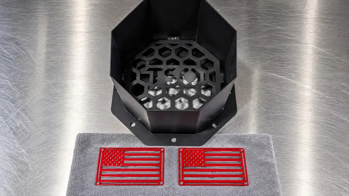 Black and red powder-coated metal parts