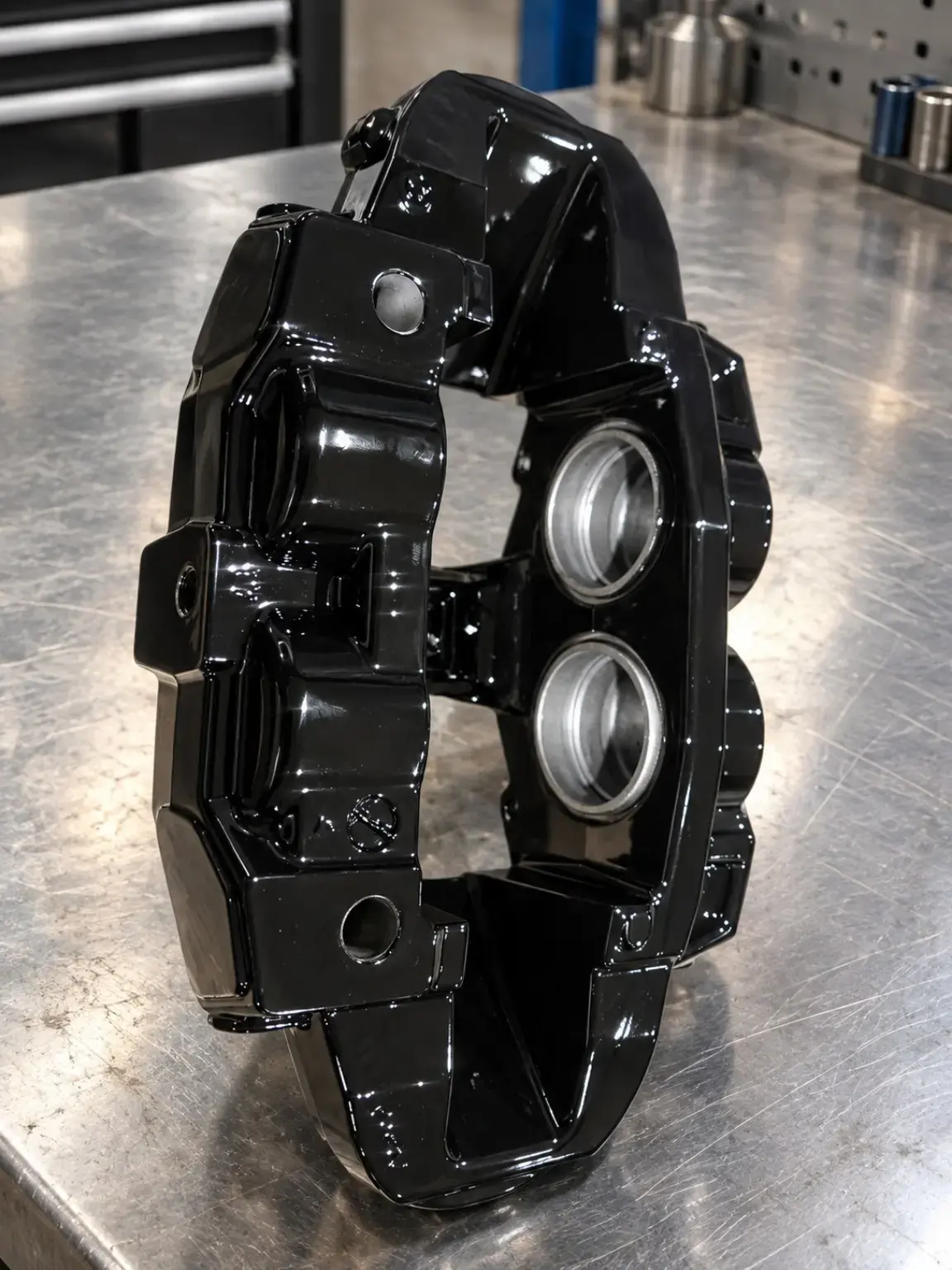 Gloss black powder-coated brake caliper